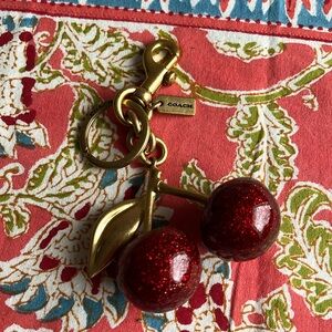 Coach cherry bag charm